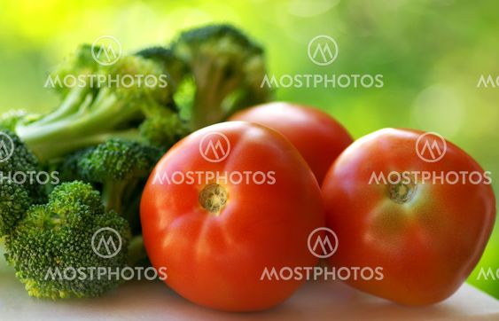 Broccoli and mature tomato.