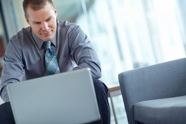 Business, thinking and man with laptop, internet and...