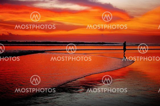 Lone figure at sunset
