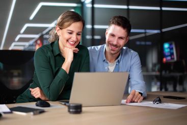 Business People Training On Computer. Young Woman