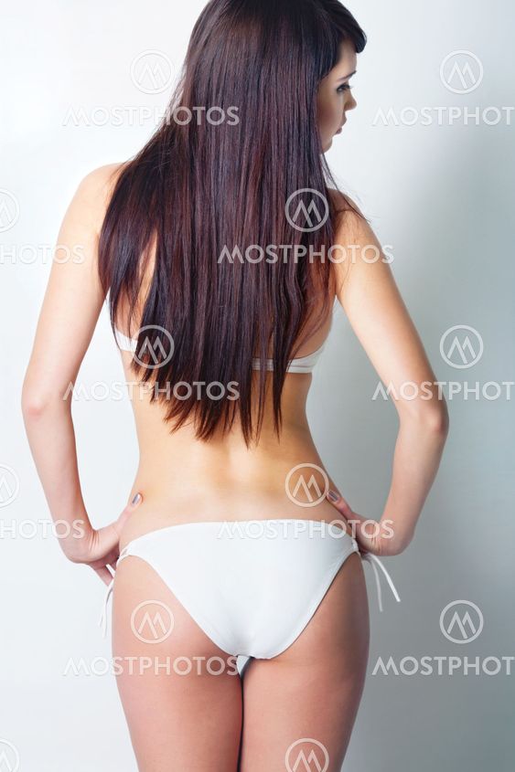 Girl in white swimsuit back to camera