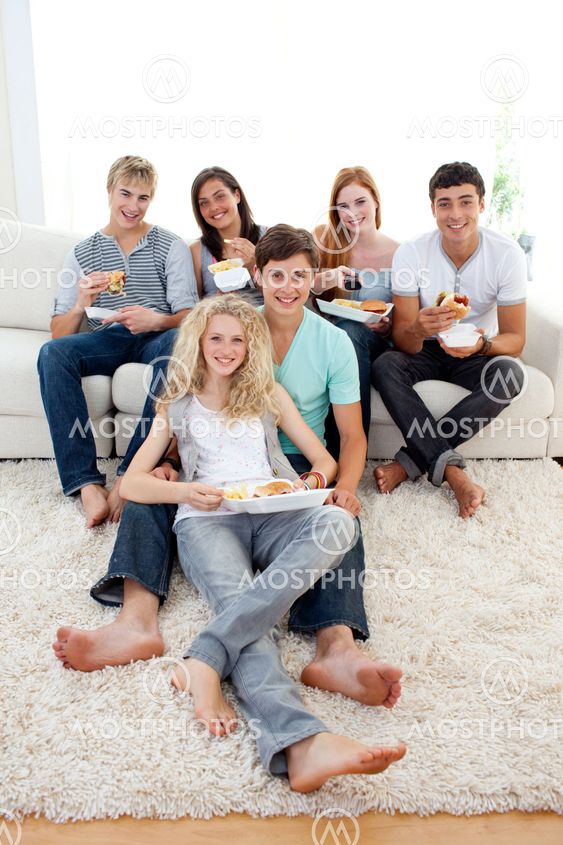 Friends eating burgers and fries