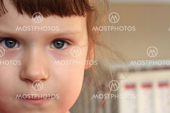 Little girl face close up with a blank space for text