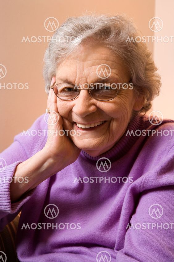 Elderly Caucasian woman smiling.