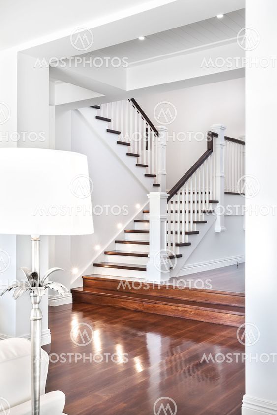 Stairs and glossy wooden floor of beautiful attractive...