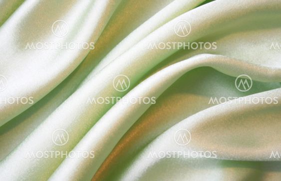 Smooth elegant green silk as background