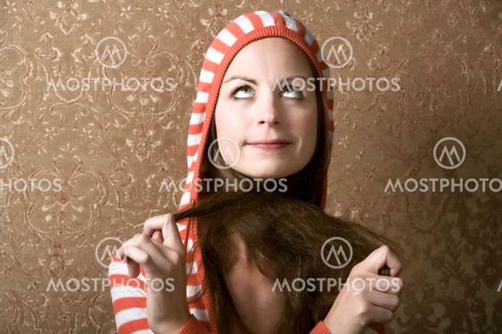 Young Woman Pulling on her Long Hair