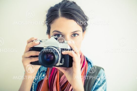 Attractive brunette taking a photo