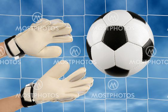 Soccer goalie’s hands in action