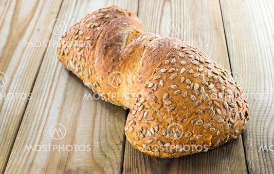 homemade fresh bread on wooden cutting board
