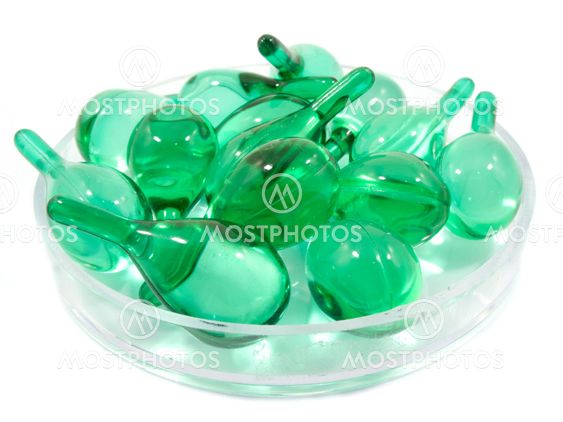 Hair vitamin serum capsule in container