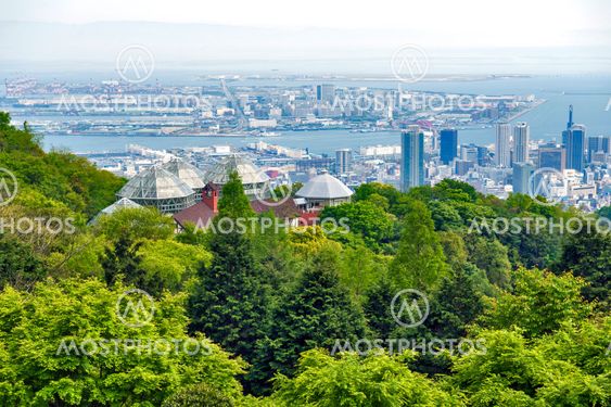 Kobe Port Island and Kobe Airport in Osaka Bay seen from Nunobiki Herb Garden on Mount Rokko in Kobe, Japan