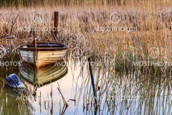 Sunset on the lake Balaton with a boat