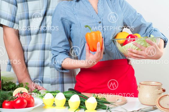 couple of cooking together