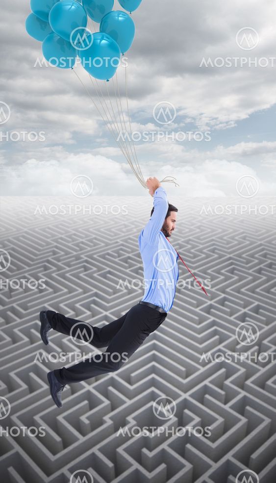 Composite image of businessman flying with balloons