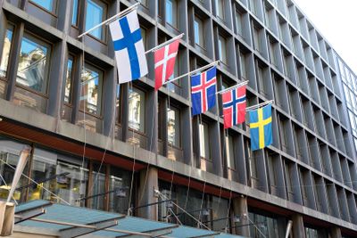 The flags of the countries of Scandinavia waving on hotel...