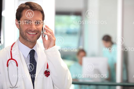 portrait of a doctor on the phone