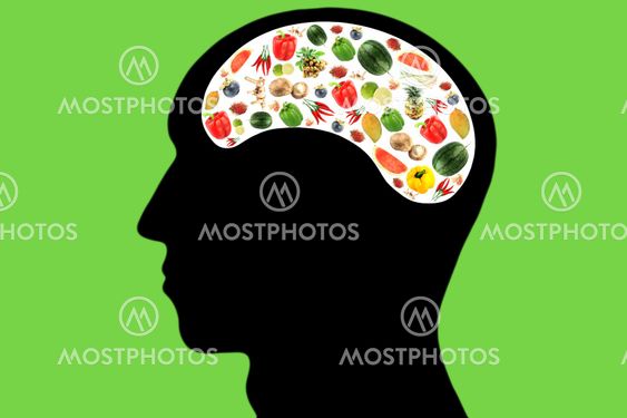 Vegetables and fruits in Head on green Background.