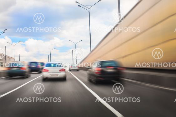 cars leaving tunnel in downtown