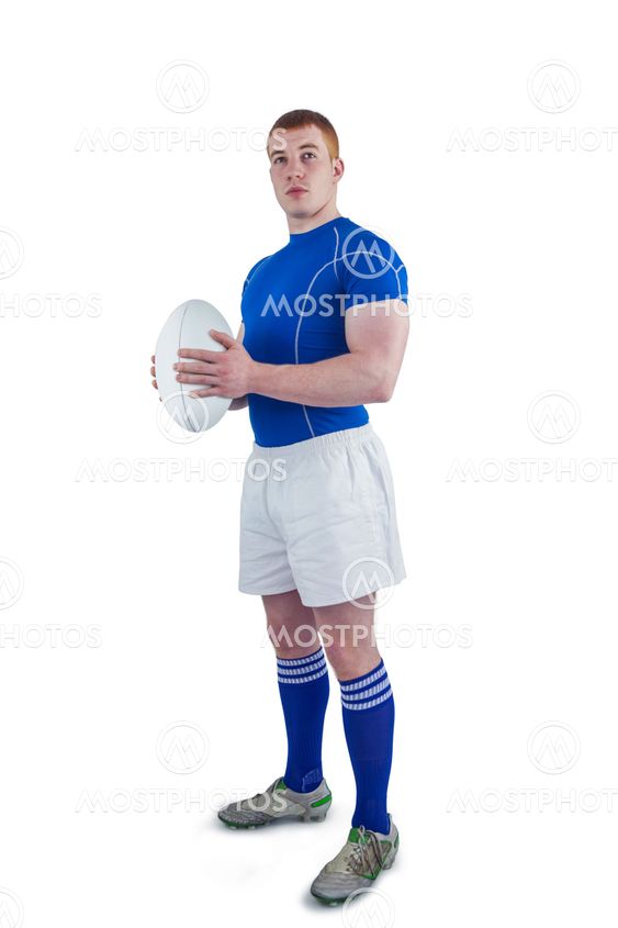 Rugby player holding rugby ball