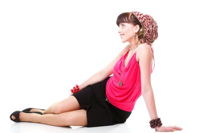 Full length woman in a turban isolated