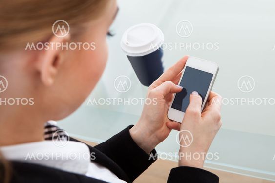 Businesswoman Using Cellphone