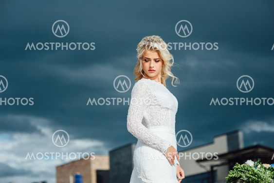 Beautiful young bride in luxury wedding dress