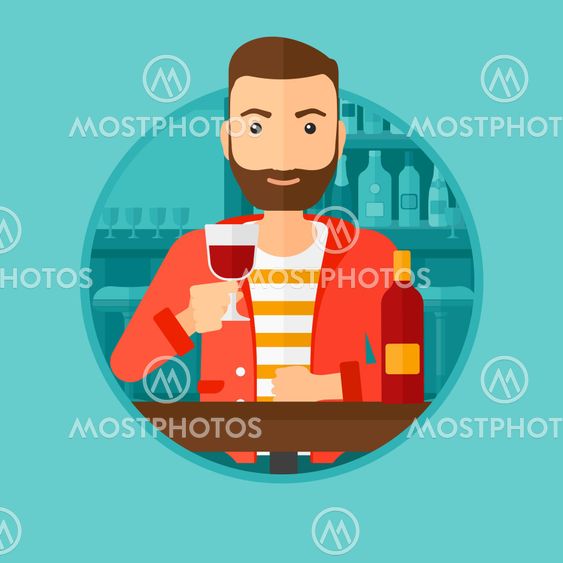 Man drinking wine at restaurant.