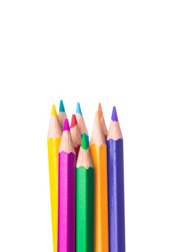 Colorful arrangement of pencils in various shades on a...