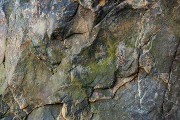 Large rocky rocks. Rocks of rocks. Gray moss-covered rocks