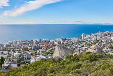 City, sea and greenery with landscape view for ocean,...