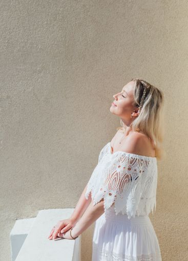 Beautiful woman in summer dress smiling