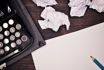 Old vintage typewriter and paper as copy space