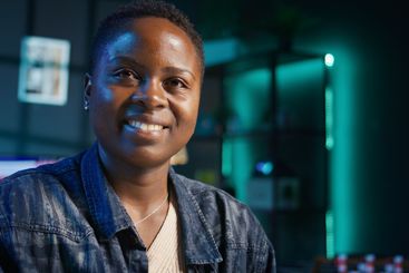 Entrepreneur working at home office desk on laptop,...