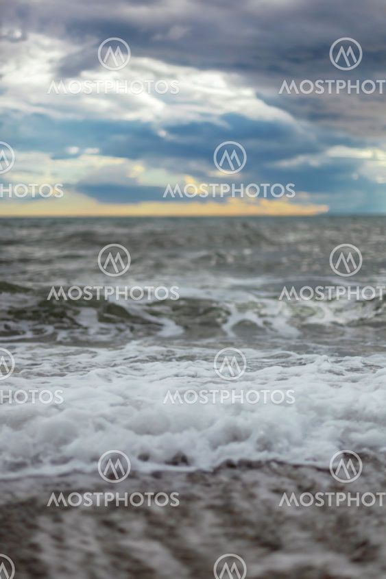 Sea or ocean cloudy sky wave after storm. Space for text.