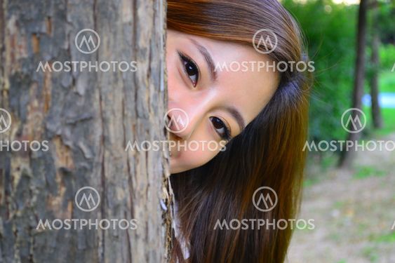 Hiding behind the tree