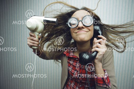 Nerdy woman drying hair