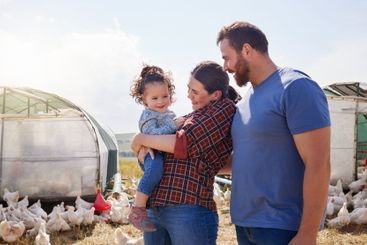 Farm, chicken and parents with child in field for...