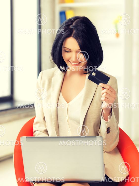 businesswoman with laptop and credit card