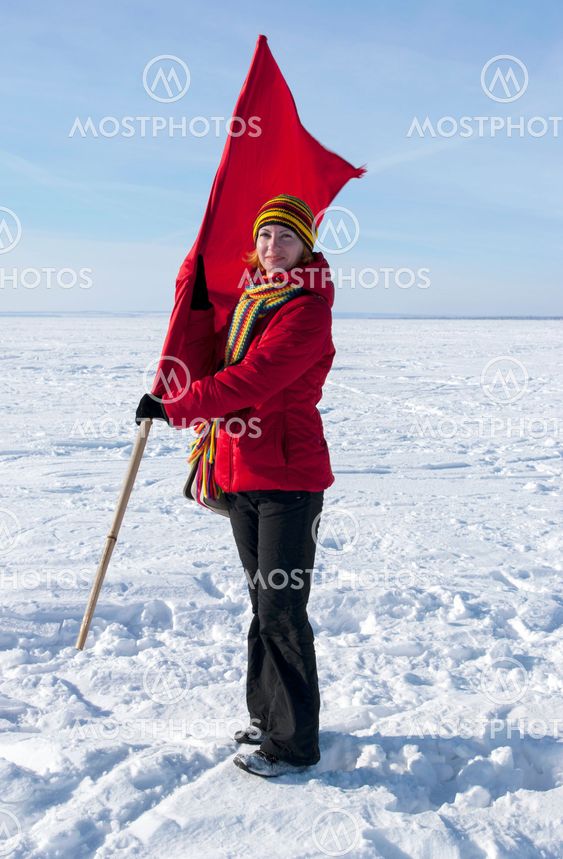 Happy girl with a red flag