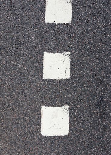 paved road, a close-up of a part of the carriageway of...
