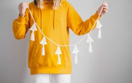 Handmade crochet new year decoration in woman hands....