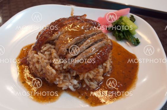 Roasted Duck with Gravy Sauce on a Jusmine Rice Chinese Style