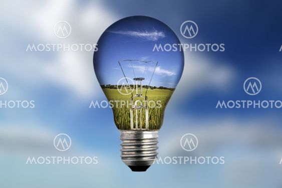 light bulb with landscape inside - environmental concept