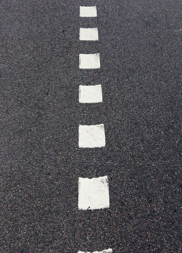 paved road, a close-up of a part of the carriageway of...