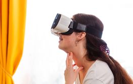 Close up of Caucasian woman testing futuristic virtual...