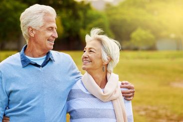 Love, hug and senior couple in park, joy and bonding...