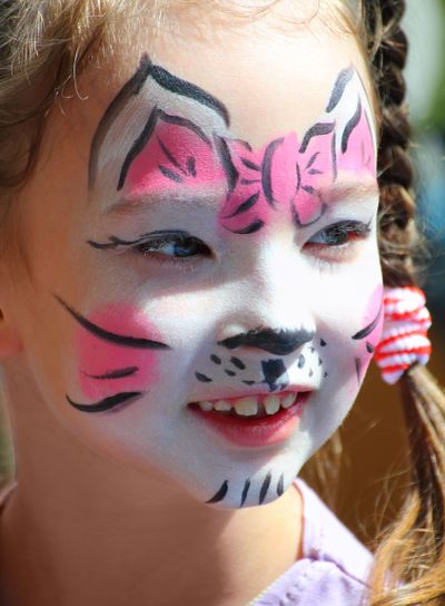 cute little girl with cat makeup
