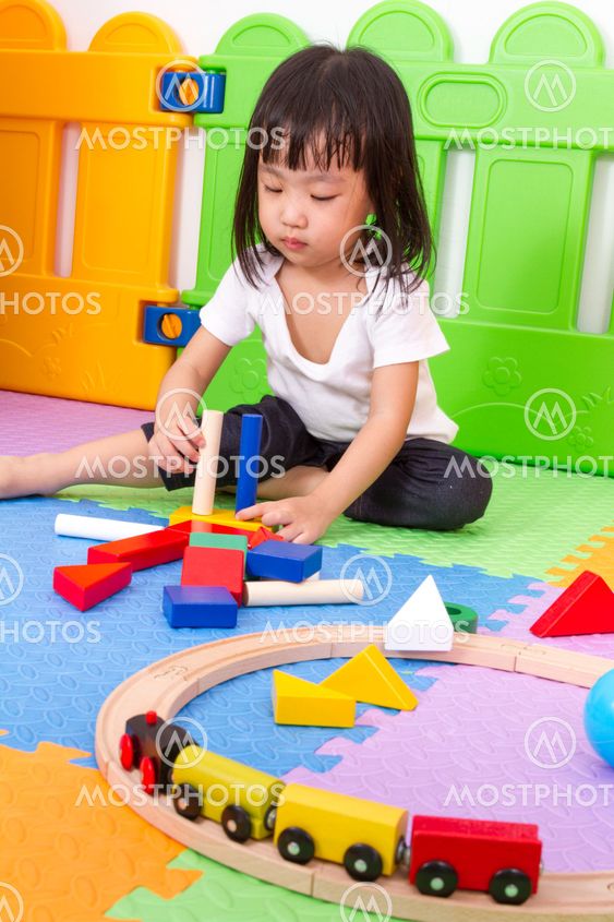 Asian Chinese children playing with blocks