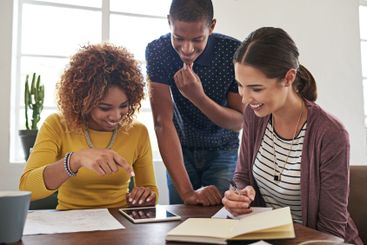 Meeting, technology and creative team in office with...